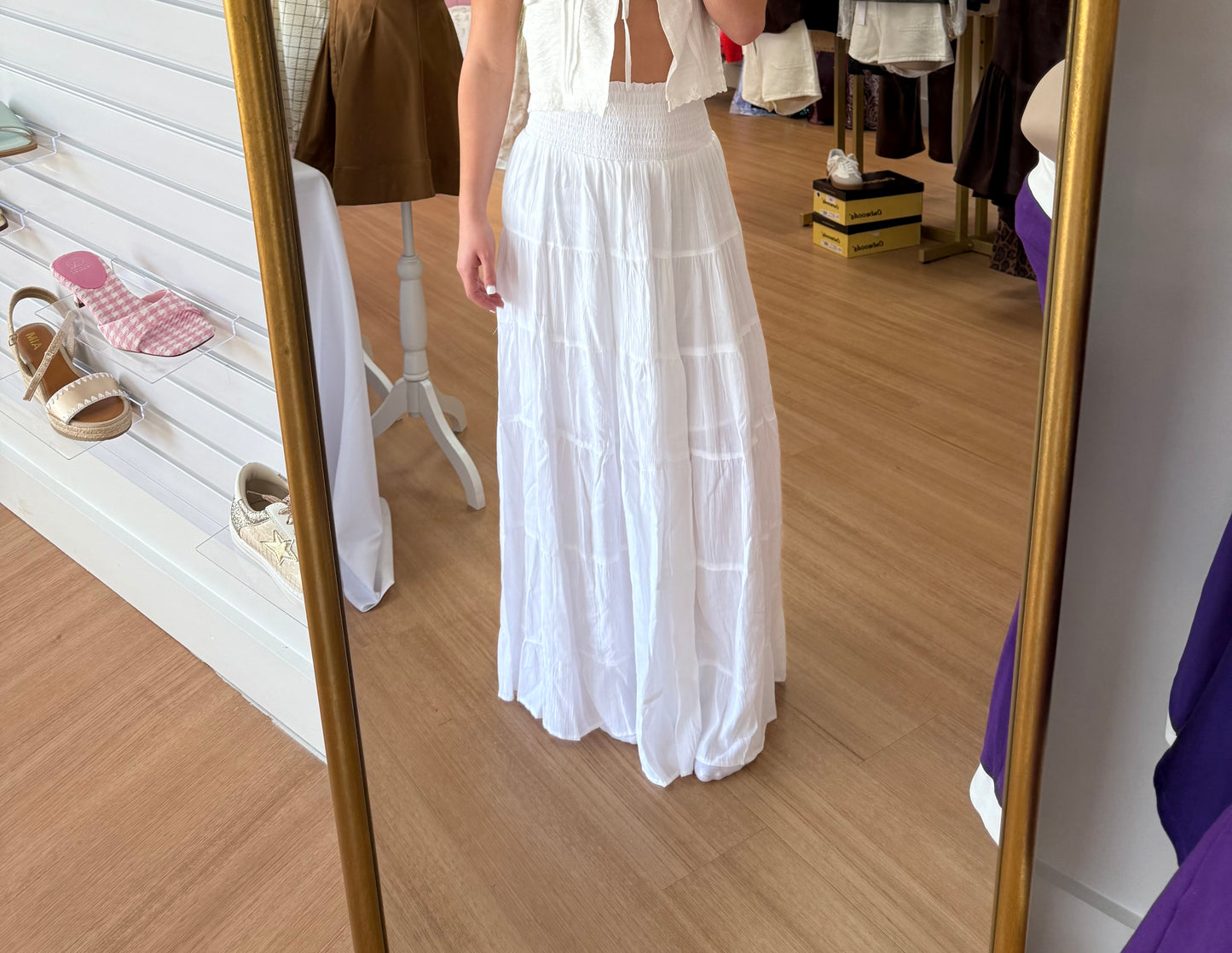 Tiered skirt with smocked waistband.