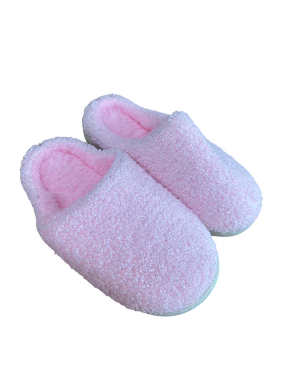 Pair of pink fuzzy slippers on a white background