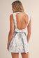 FLORAL PRINTED STRETCH TWILL OPEN BACK SKORT SET