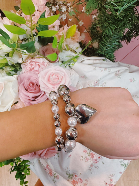 Pearl and silver heart bracelets